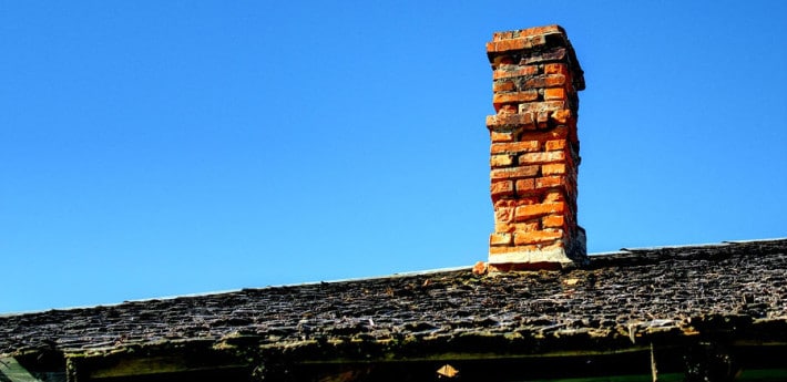 old broken and leaking chimney