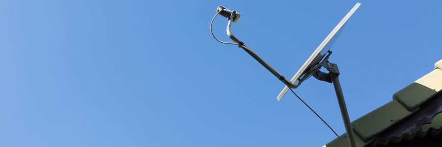 satellite dish mounted safely on a rooftop