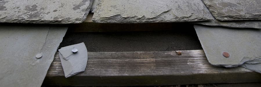 broken and fallen slate roof shingles